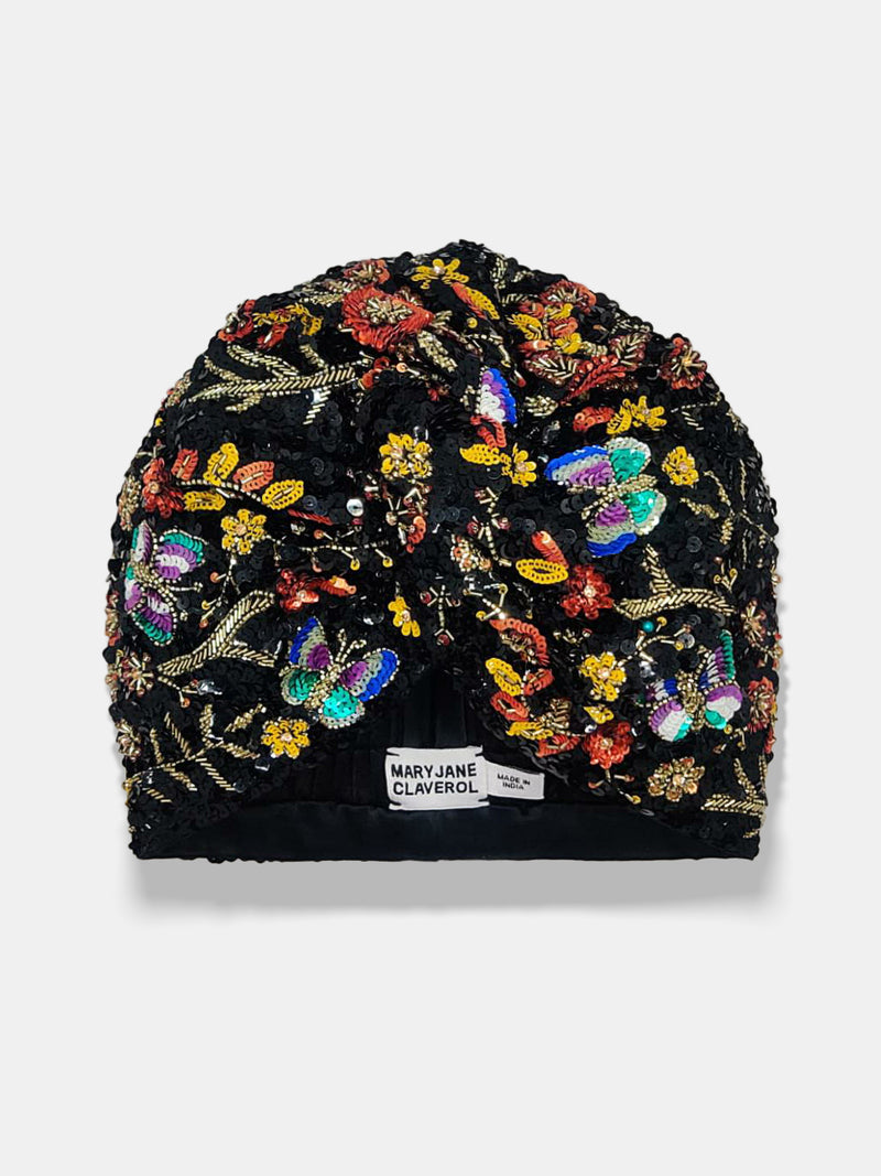 Hand made sequin-embellished black turban. Tridimensional butterfly and floral pattern designed by Maryjane Claverol