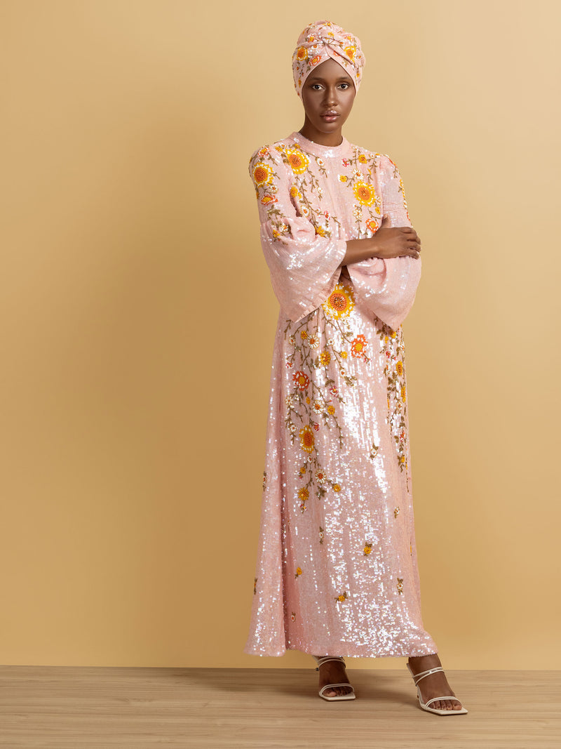 pink sequin dress designed by Maryjane Claverol  Edit alt text