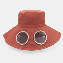 Embellished hat designed by Maryjane Claverol
